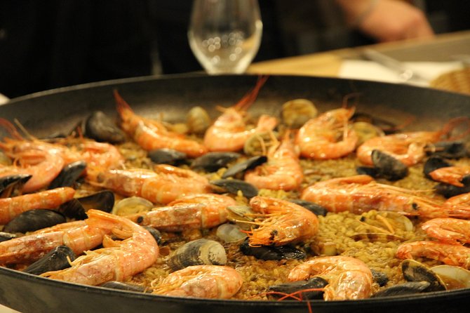 Barcelona Culinary Experience: Paella & Tapas Cooking Class - Paella is the main event