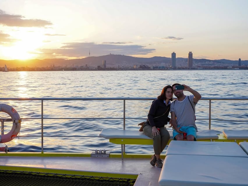Barcelona: Daytime or Sunset Catamaran Cruise with Music - Drinks, snacks, and the wave-shaped bar
