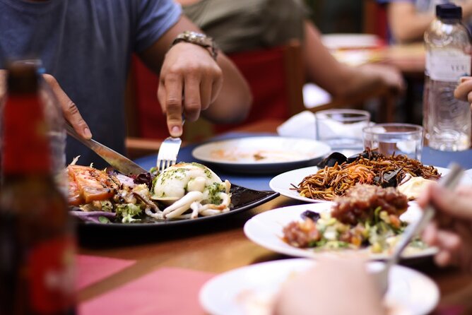 Barcelona Food Tour: Tapas, Paella, Sangria & 8+ Local Tastings - Starting among Gothic Quarter stones