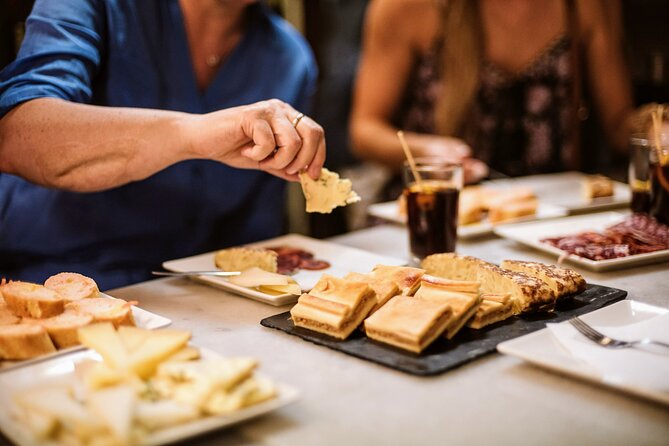 Barcelona Gothic Quarter Tapas & Taverns Food & Wine Tour - Roman stones and Barcelona stories