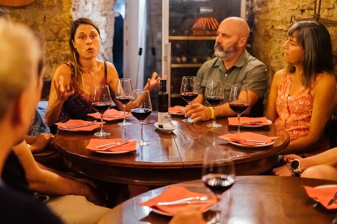 Barcelona: La Boqueria Food, Wine & History Walking Tour - Tapas, wine and the value of four stops
