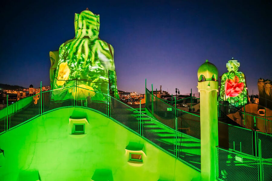 Barcelona: La Pedrera Night Experience - The rooftop show turns chimneys into scenery