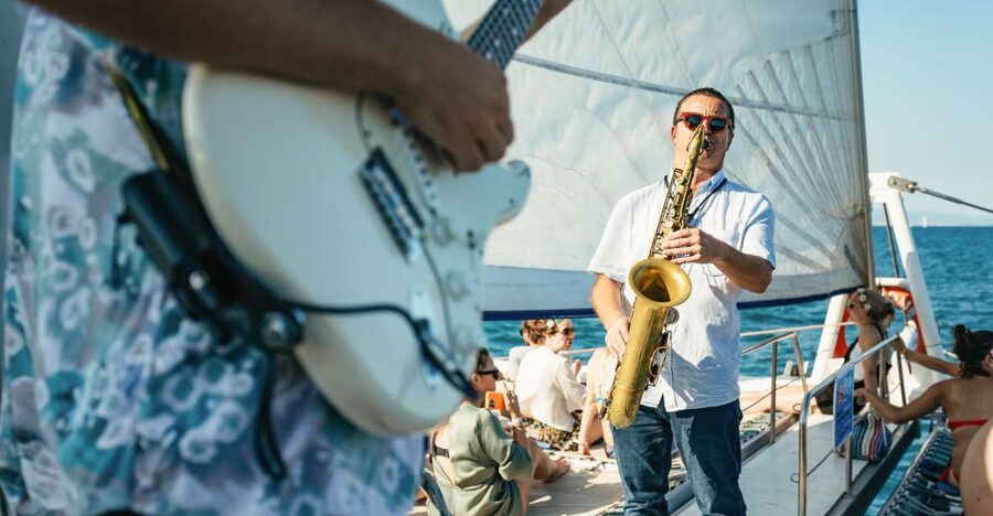 Barcelona: Sunset Catamaran Cruise with Live Music - Sailing along Barcelona’s coast
