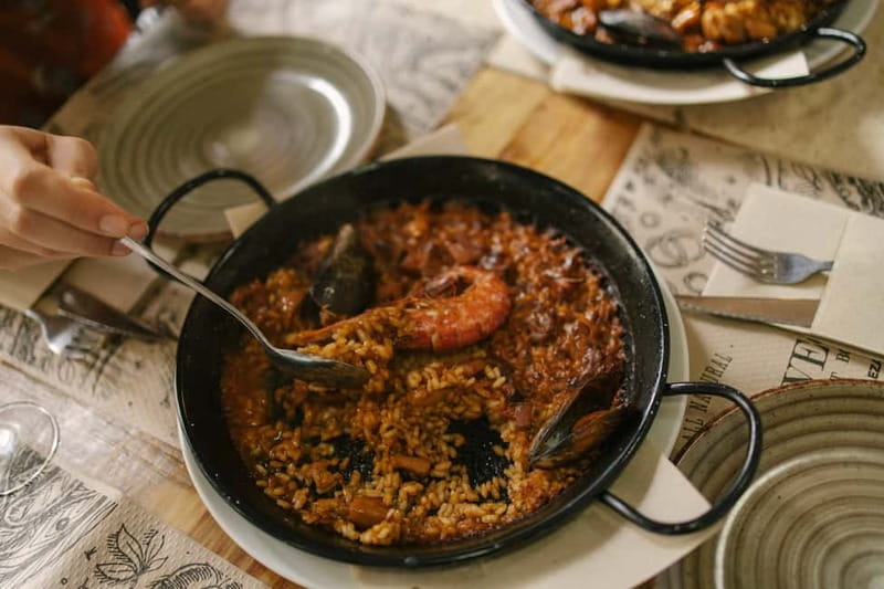 Barcelona: Tapas Food Crawl Walking Tour with Tastings - Five tapas, from croquetas to paella