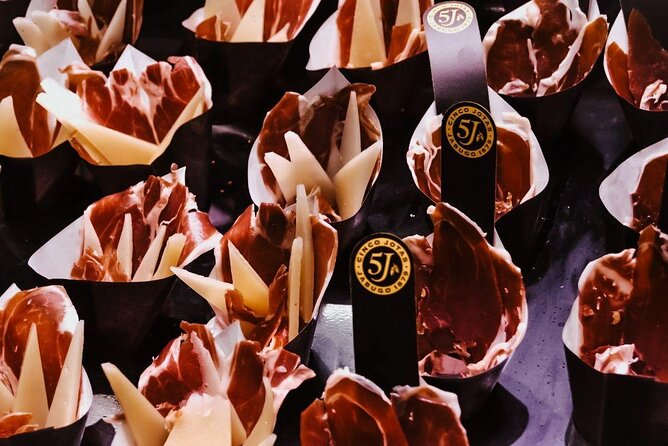 Barcelona Tapas Walking Tour: Food, Wine & History - Starting near La Rambla at Travellers Nest Bar