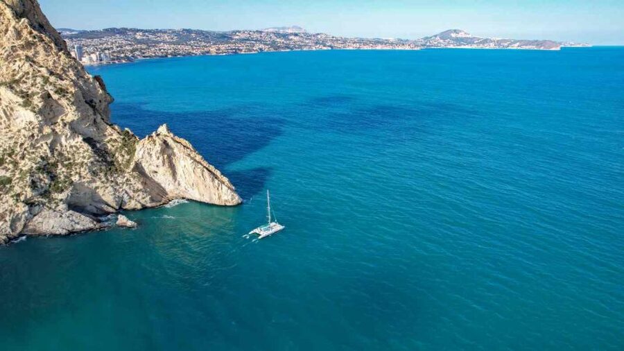 Calpe: Sailing Catamaran with Lunch - The anchored cove and swimming stop