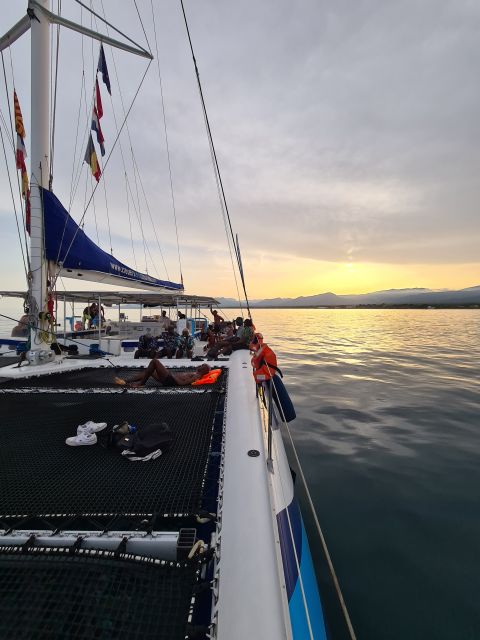 Cambrils: Costa Dorada Sunset Catamaran Cruise with Drinks - Watching the sunset from the catamaran
