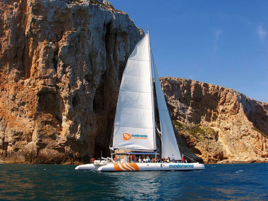 Dénia & Jávea: Portixol Sailing Catamaran Excursion with BBQ - The Dénia and Jávea coastline from the water