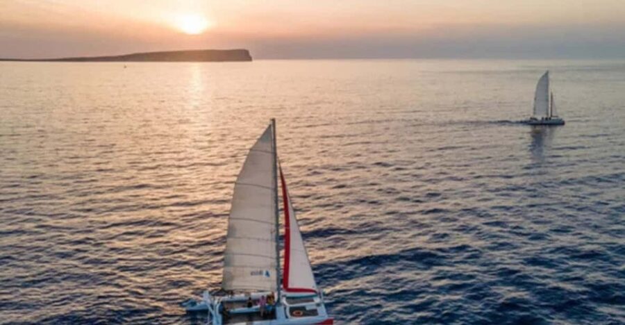 Fornells: Catamaran Sunset Cruise of Menorca's Coast - Sailing along Menorca’s northern coast