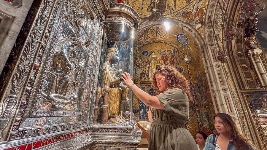 From Barcelona: Montserrat Tour, Rack Railway & Licor Taste - Inside the basilica and the Throne of the Virgin
