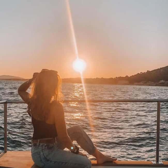 From Denia: Catamaran Trip with Sunset Option - Cova Tallada from the water