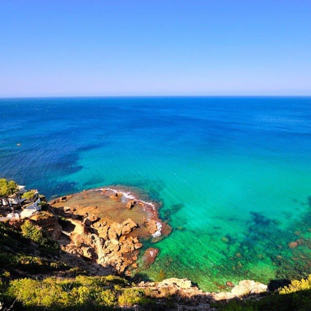 From Dénia/Jávea: Cala Blanca Boat Trip with Jet Ski & Lunch - The catamaran ride and coastal views