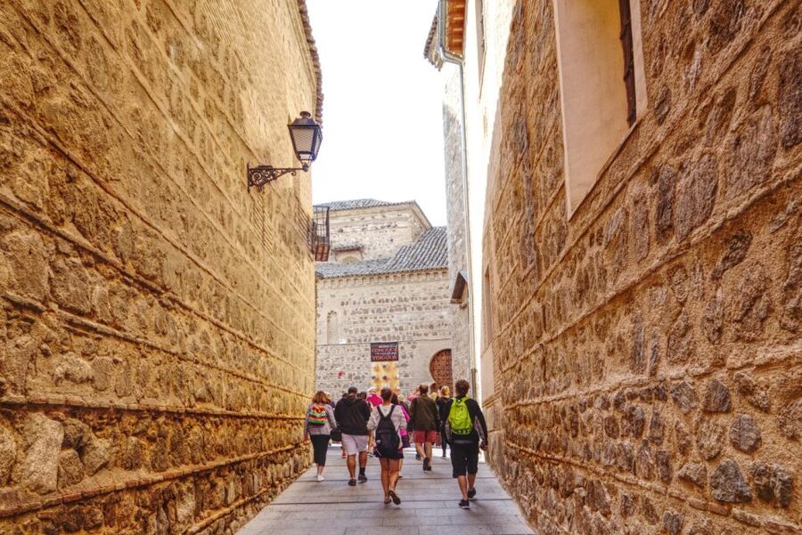 From Madrid: Toledo and Segovia Guided Day Trip - Entering Segovia beside the Roman Aqueduct