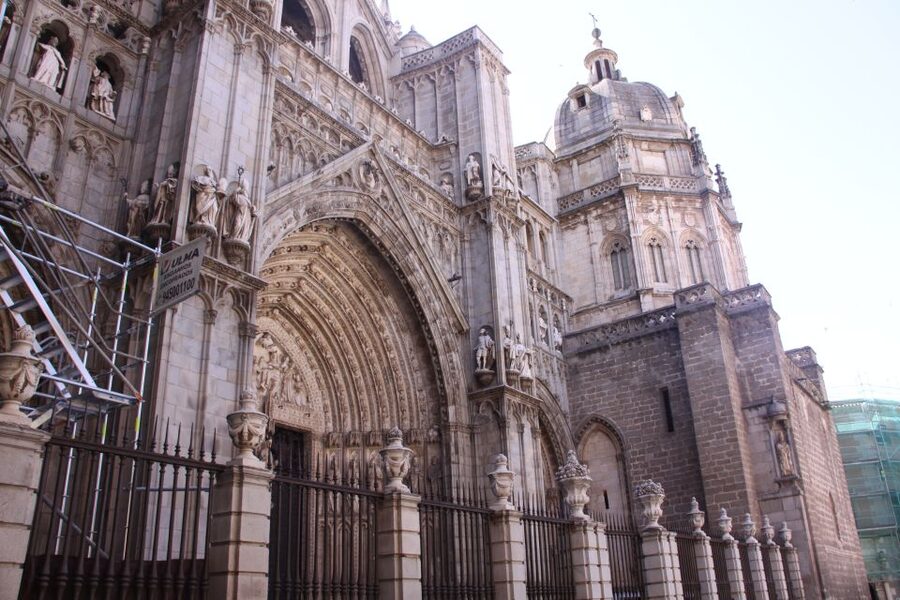 From Madrid: Toledo & Jewish Quarter Half-Day Tour - Don Quixote, old streets, and free time