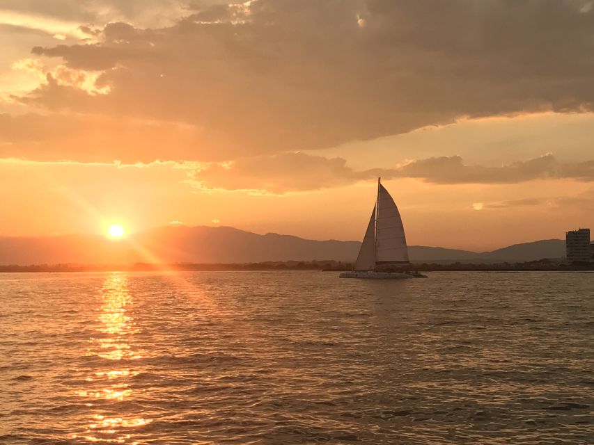 From Roses: Sunset Catamaran Cruise - Roses Bay from the water