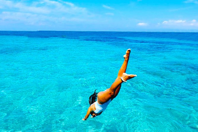 Ibiza Beach Hopping Cruise with Paddleboards, Drinks and Food 6h - The open-water swim is the main event