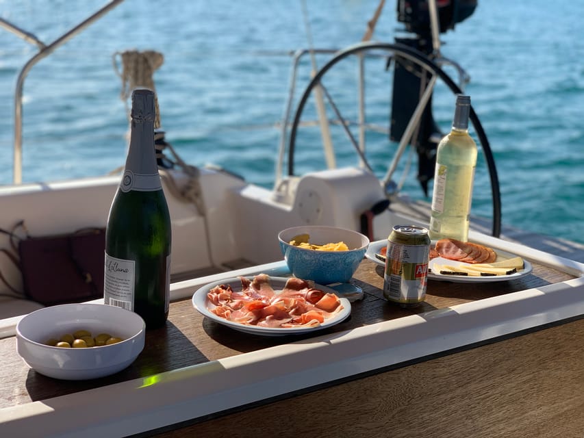 Ibiza: Midday or Sunset Sailing with Snacks and Open Bar - The swim stop, paddleboards, and snorkel gear
