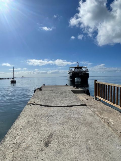 Ibiza: Platja d'en Bossa Round-Trip Transfer to Formentera - Finding the Sea Experience stand in Platja den Bossa