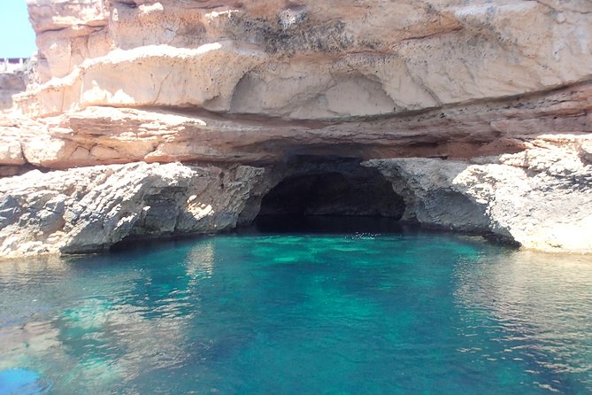 Ibiza Snorkeling Beach and Cave Tour - Leaving San Antonio Bay