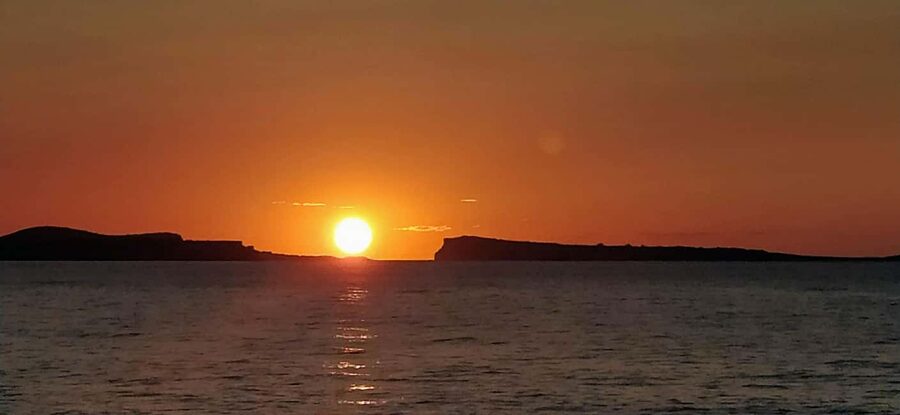 Ibiza: Snorkeling, Sunset Beach and Cave Boat Trip - First water stop: fish, reefs, and clear coves