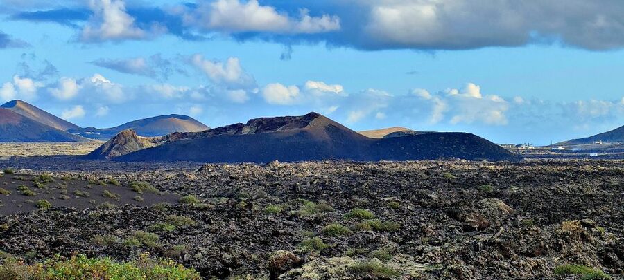 Lanzarote E-Bike Tour: Volcano Craters & Scenic Vineyards - Timanfaya’s craters and the feel of volcanic ground