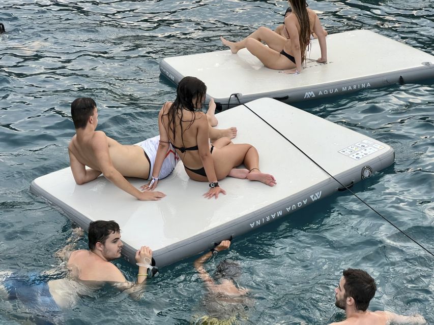 Lloret de Mar: Sunset Catamaran Cruise with DJ and Drinks - Drinks, Music, and the Party Mood