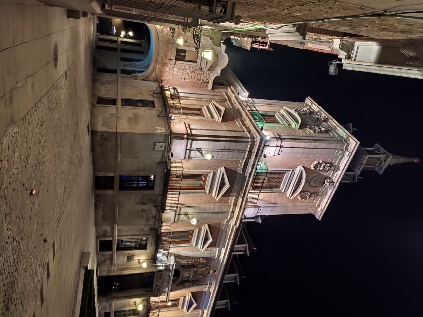 Madrid: Enchanted Evening Walking Tour in Spanish - Almudena Cathedral and the city’s older stories