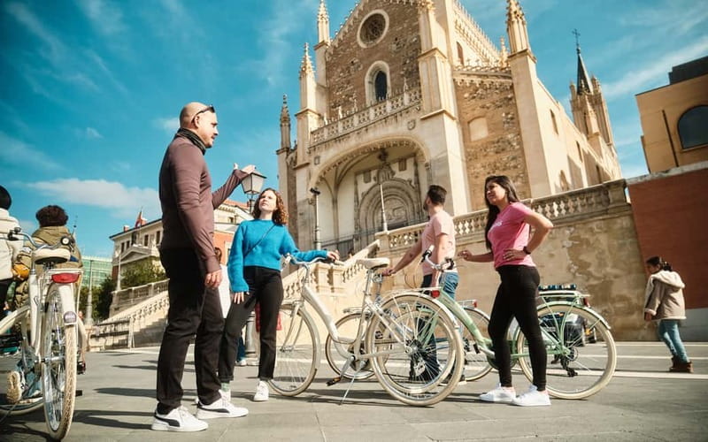 Madrid: Highlights Guided Vintage Bike Tour and Tapas Option - Royal Palace, Plaza de la Villa, and Plaza Mayor