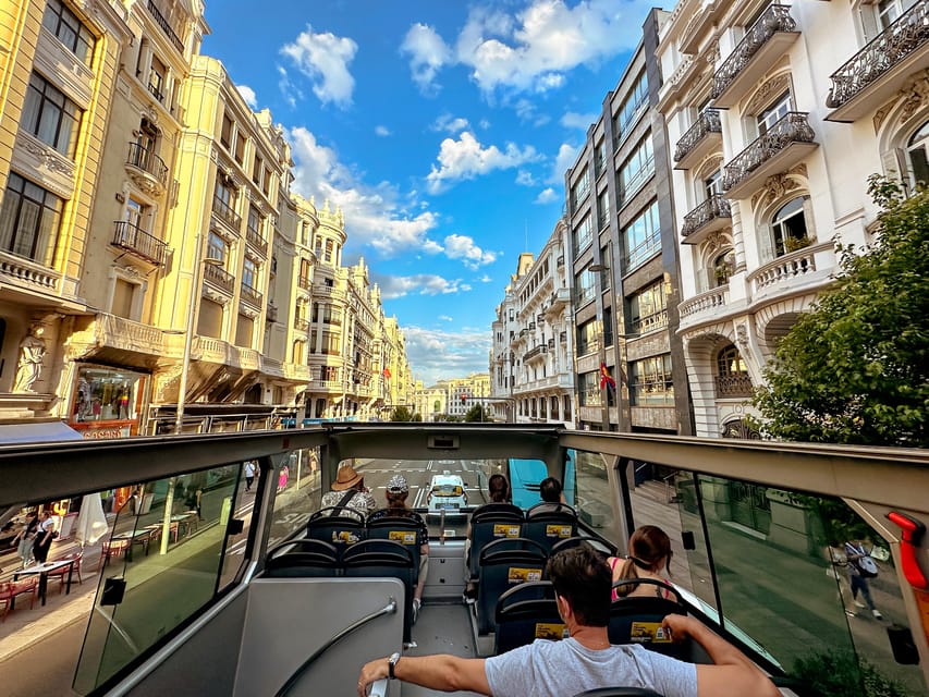 Madrid: Panoramic Open-Top Bus Day or Night Tour with Guide - Prado, Puerta de Alcalá, and Retiro Park
