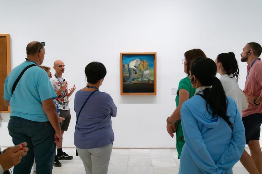 Madrid: Reina Sofia and Prado Museum Tickets and Guided Tour - Walking toward the Prado and changing artistic worlds