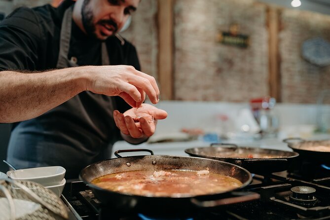 Madrid Tapas & Paella Cooking Experience with Local Market Visit - From market stalls to a Huertas kitchen
