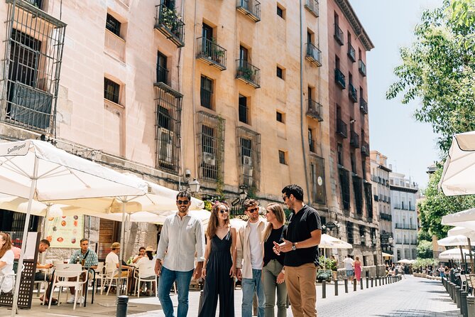 Madrid Tapas & Wine Tour with Rooftop Views and Local Guide - Plaza Mayor and Iberian ham