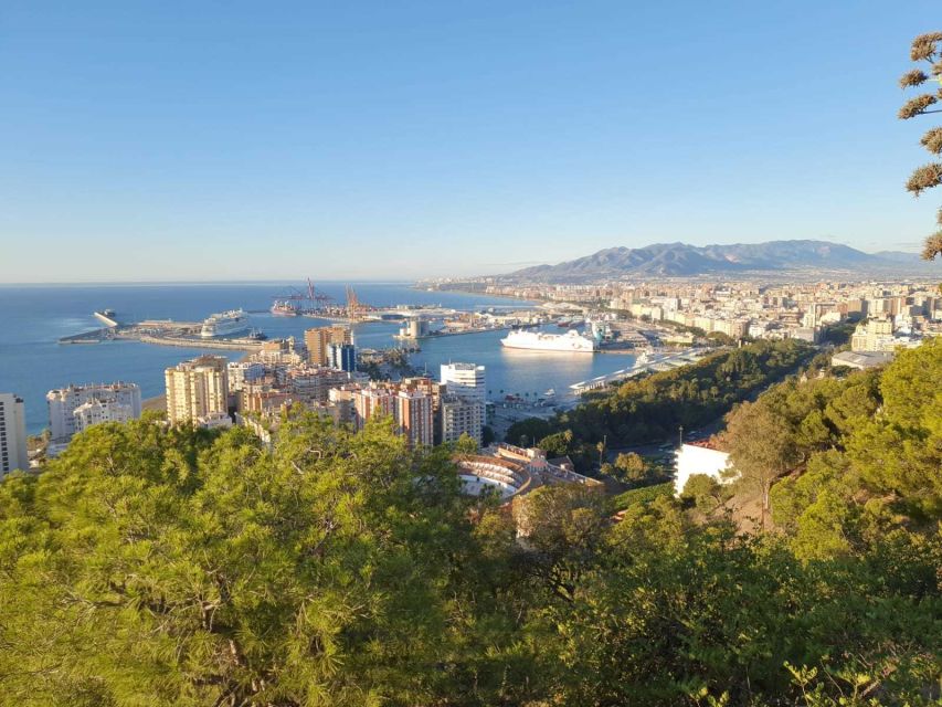 Malaga: Guided E-Bike Tour - Down past the Alcazaba walls