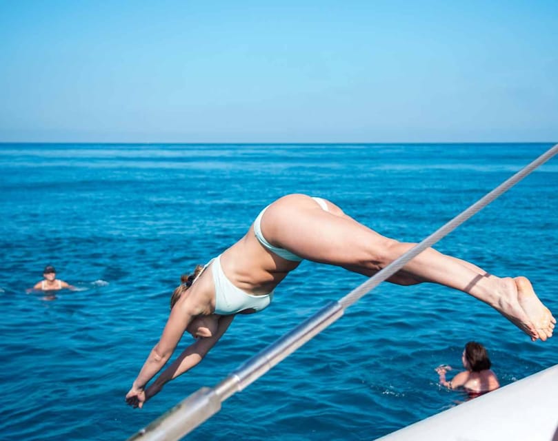 Malaga: Sailing Catamaran with Swimming and Paella Lunch - The swimming stop away from the shore