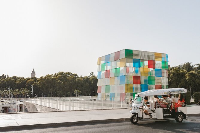 Malaga Welcome Tour with Local Guide in Eco Tuk Tuk Private - The cathedral, university, and civic center
