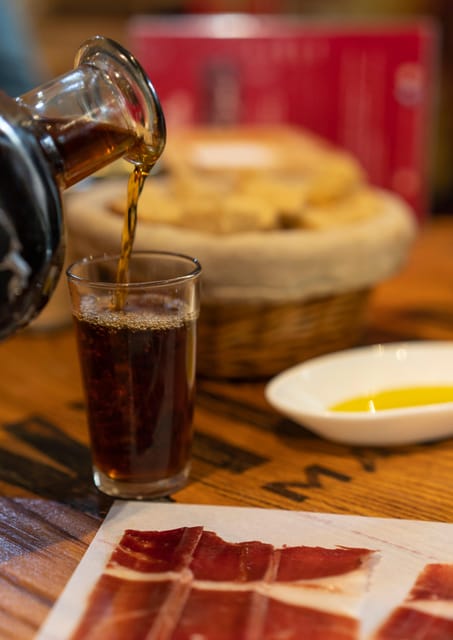 Málaga: Wine & Tapas Tour - Second stop: vermouth, sausage, and cheese