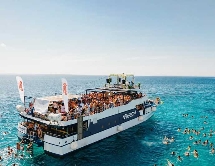Mallorca: Boat Party with Live DJs, Lunch, & Nightclub Entry - Paella lunch and drinks onboard
