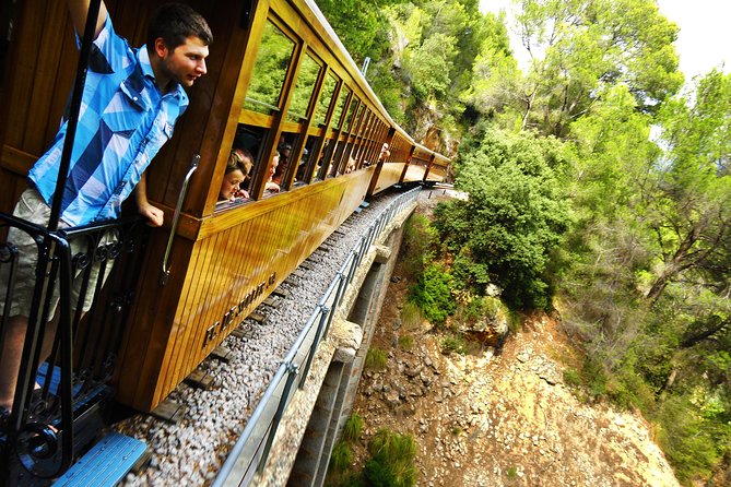 Mallorca in One Day Sightseeing Tour with Boat Ride and Vintage Train - The Sa Calobra road and its famous bends