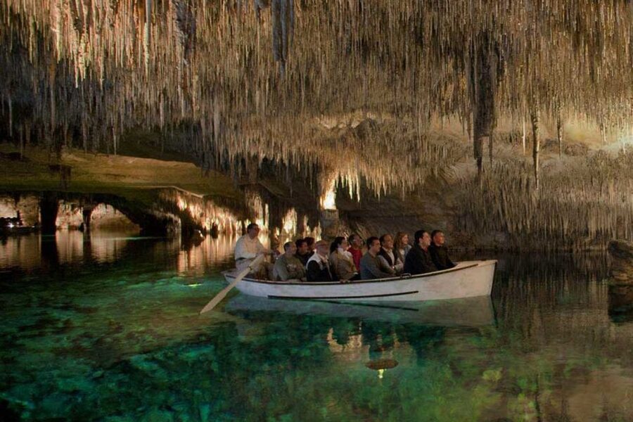 Mallorca: Ticket for Caves of Drach with Pickup Service - Crossing the lake by boat or bridge