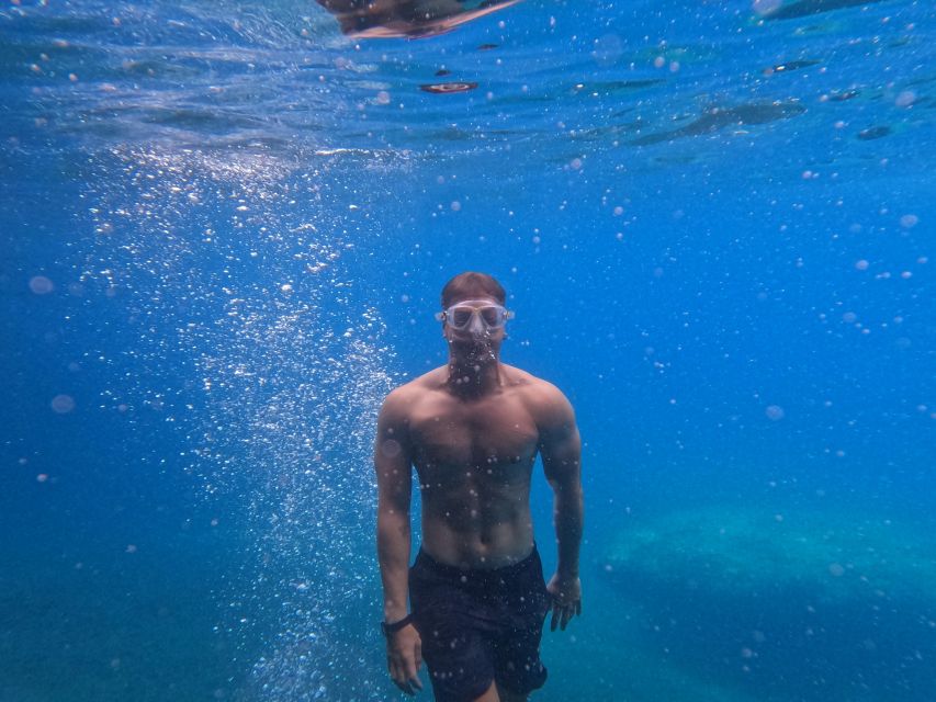 Moraig: Kayak Excursion to Moraig & Cave peces-testos - Swimming and snorkeling at Cala Testos