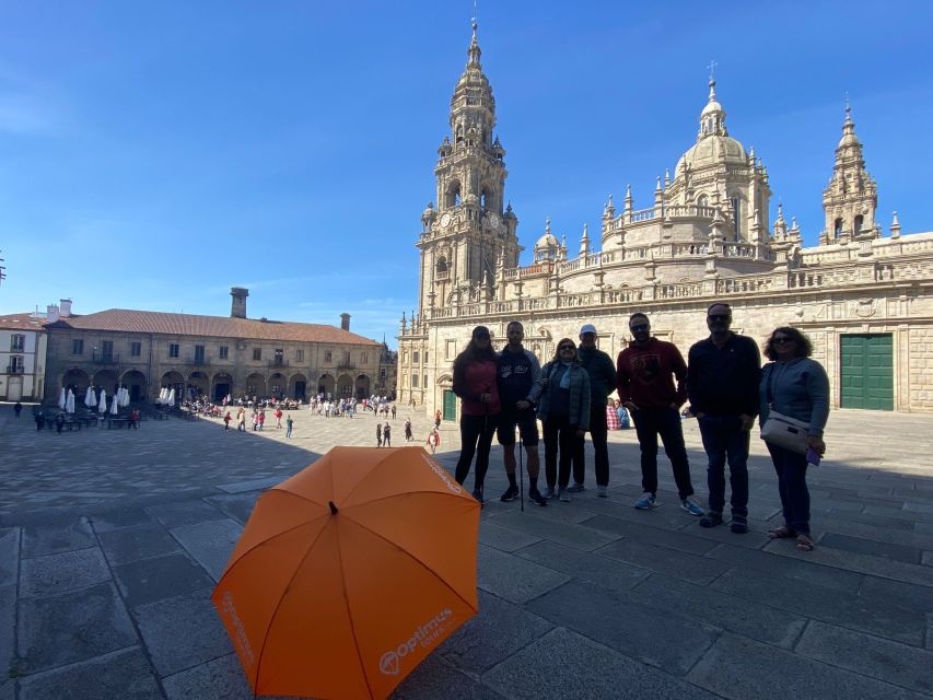 Santiago Complete Tour: City, Portico and Cathedral Tickets - Starting under the blue umbrella in Obradoiro Square