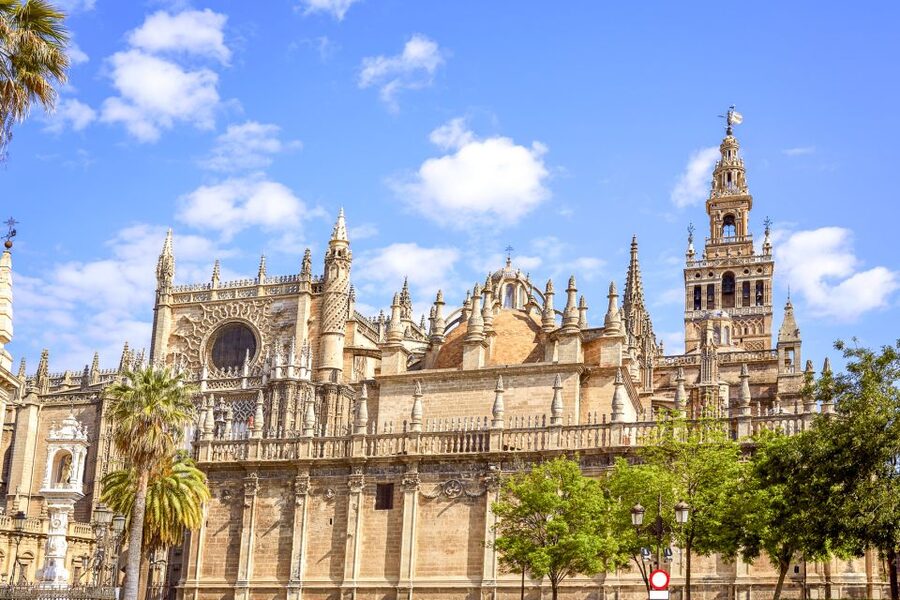 Seville Cathedral and Giralda Tower Guided Tour and Tickets - Inside the Cathedral: Art, Light, and Scale