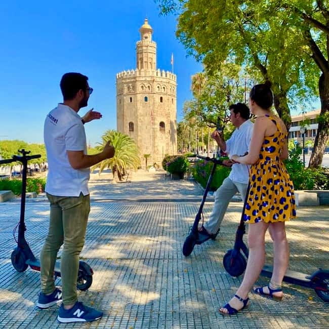 Seville: Electric Bike City Tour - Crossing the Puente de Isabel II