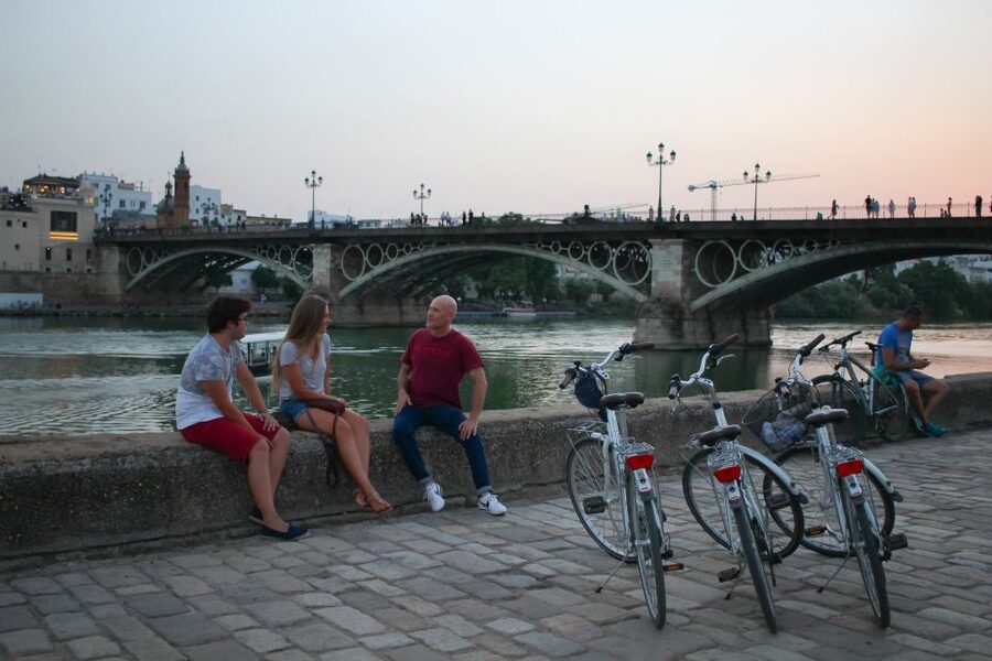 Seville: Guided Sunset Bike Tour - The cathedral and Alcázar from the outside