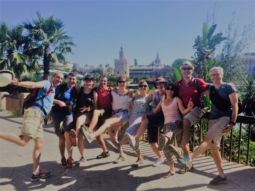 Seville: Highlights Bike Tour with Local Guide - Along the river to La Cartuja and the Seville Tower