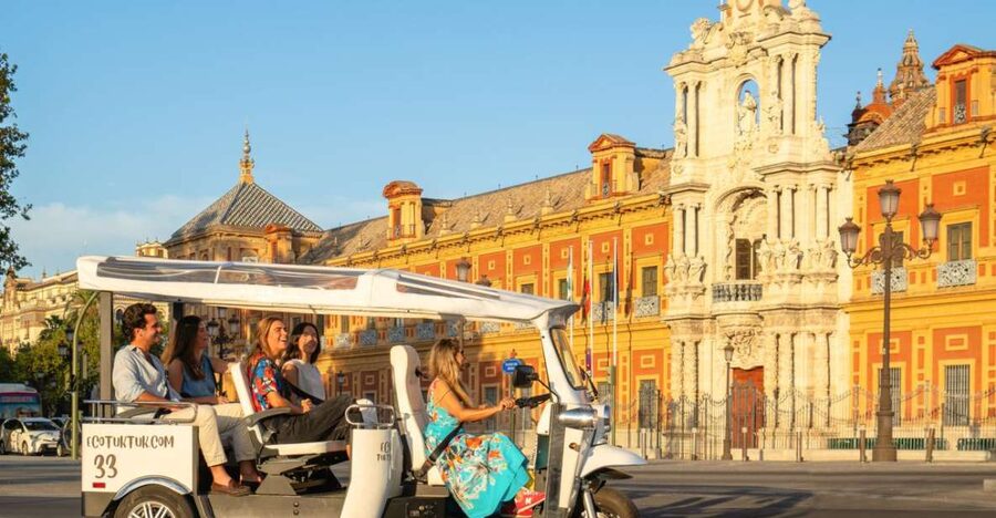 Seville: Private City Tour by Eco Tuk Tuk - Crossing Triana by Puente de Isabel II