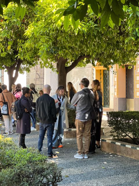Seville: Small Group Jewish Quarter Tour with Tapas & Drinks - Calle Agua and the legends of the quarter