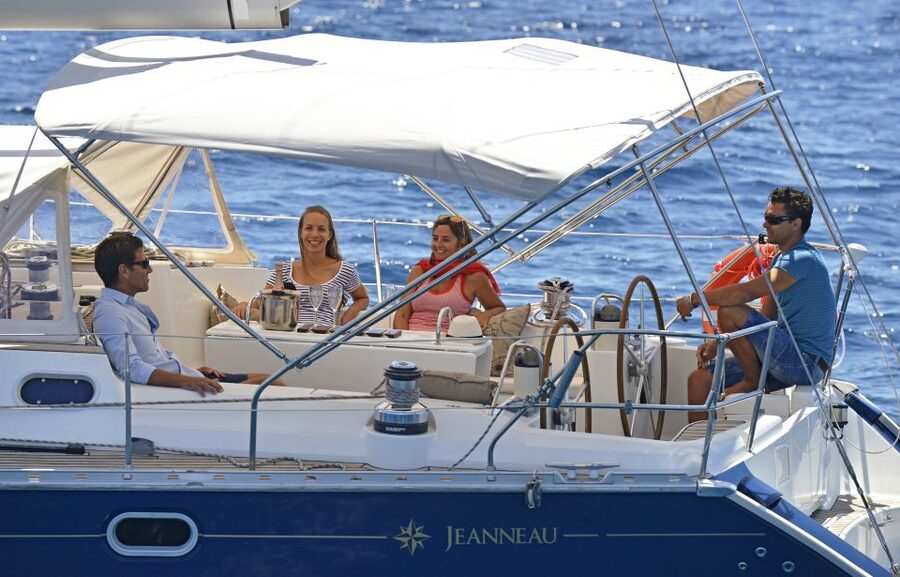 Tenerife: Sailing Excursion with Whale and Dolphin Watching - Boarding at Puerto Colón and settling onto the yacht