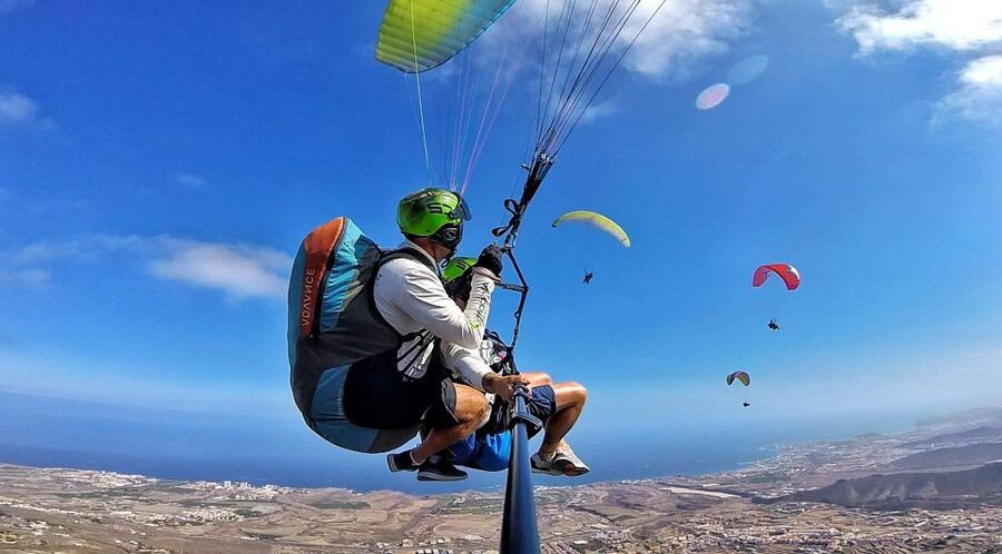 Tenerife: Tandem Paragliding Flight - Getting ready with a harness, helmet, and GoPro