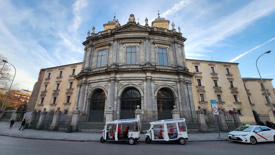 Tour Madrid: Secrets in a Electric Tuk Tuk - The Royal Palace and its Baroque façade